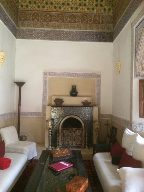 Riad staff set a cozy fire each night for us in this historic room with its gorgeous ceiling