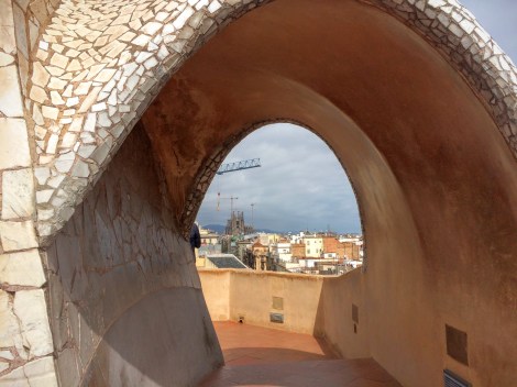 Gaudí's Casa Milá (La Pedrera) - Sagrada Familia in the distance